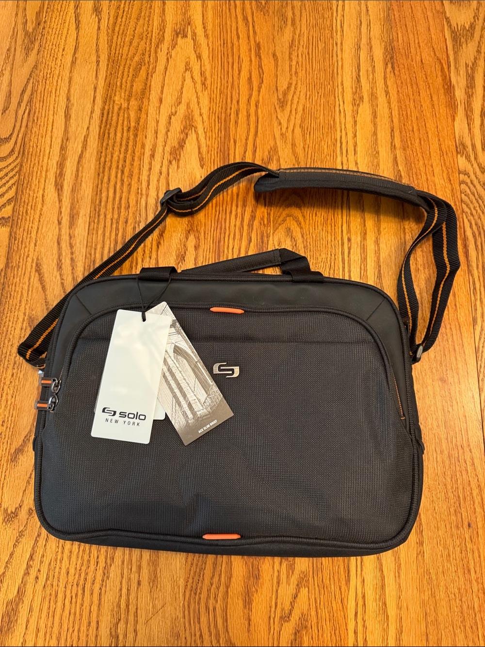 solo Black Laptop Messenger Bag with Orange Accents